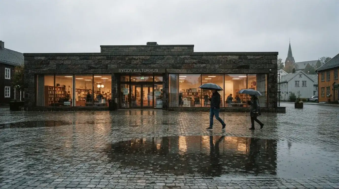 Lav bankbygning i stein med store vinduer i regnvær, folk med paraplyer foran
